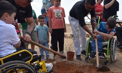 Ortopedik Özürlüler Derneği’nden Derinya’da ağaç dikme ve piknik etkinliği