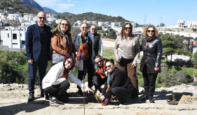 Girne'de 150 fidan toprakla buluşturuldu